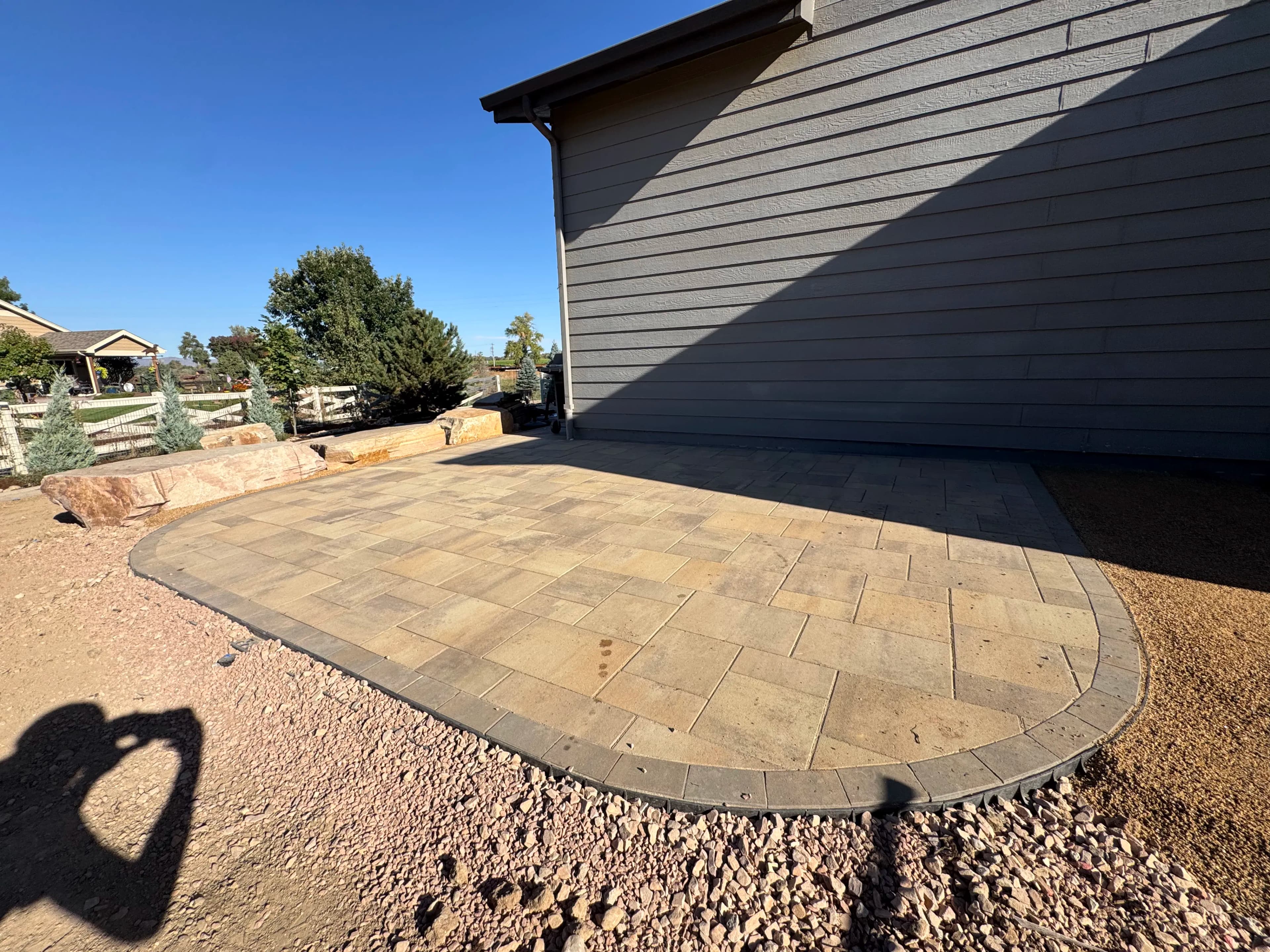 Project Full Backyard Overhaul with Paver Patio and Boulder Seating Wall image