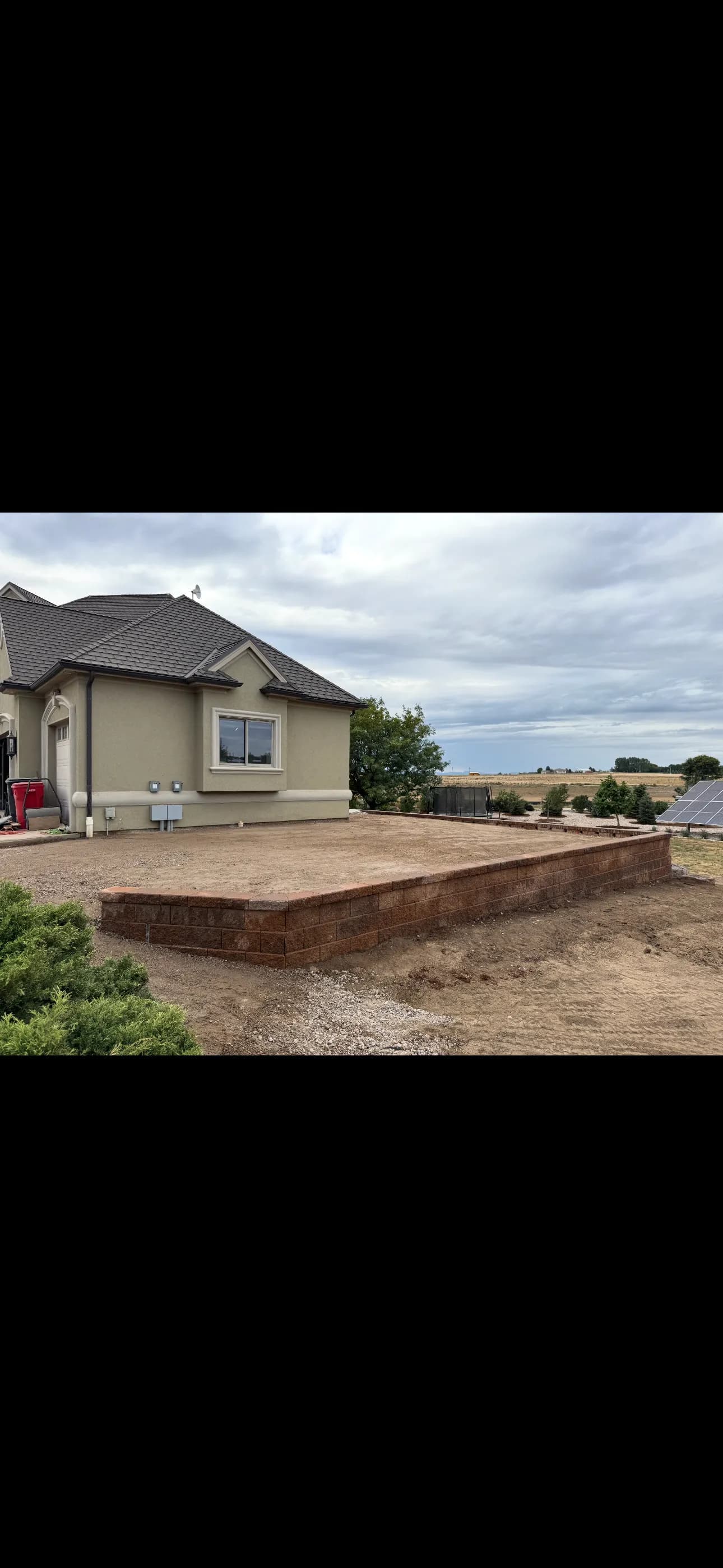 Gallery photos for Tiered Retaining Wall with Paver Steps Built to Last: Image #2