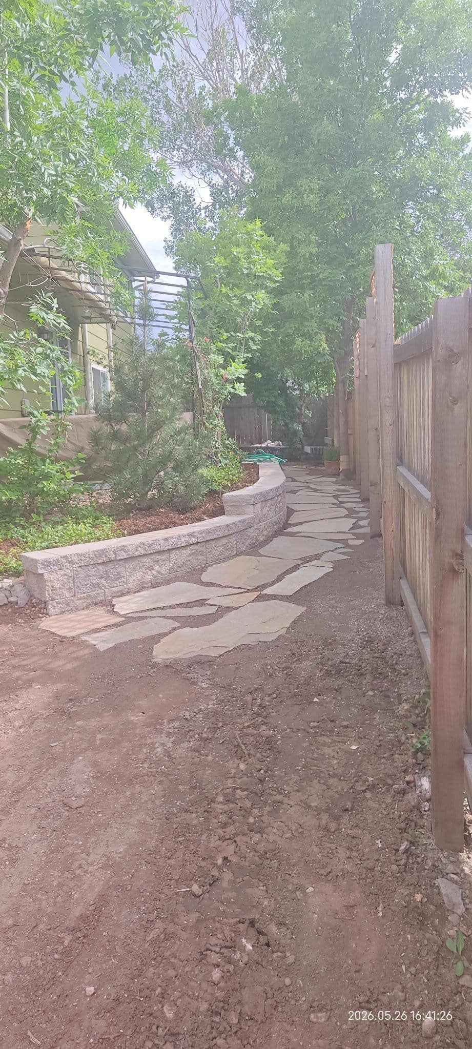 Project Retaining Wall, Flagstone Walkway and Cobblestone Edging Done Right image