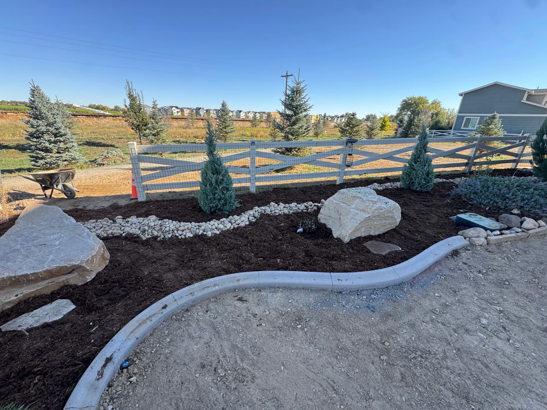 Gallery photos for Full Backyard Overhaul with Paver Patio and Boulder Seating Wall: Image #3
