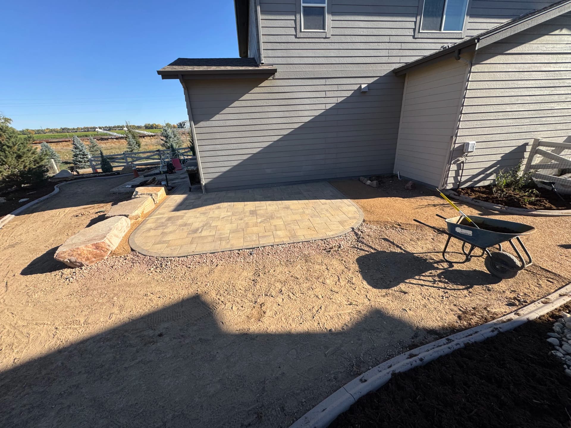 Gallery photos for Full Backyard Overhaul with Paver Patio and Boulder Seating Wall: Image #4