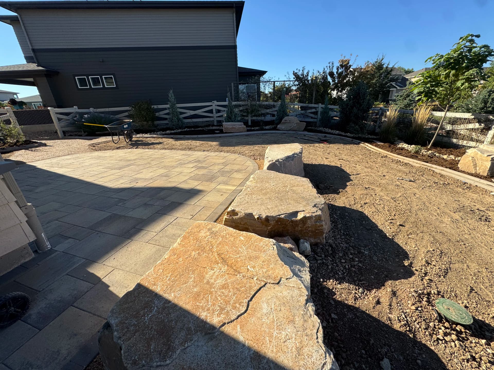 Gallery photos for Full Backyard Overhaul with Paver Patio and Boulder Seating Wall: Image #1