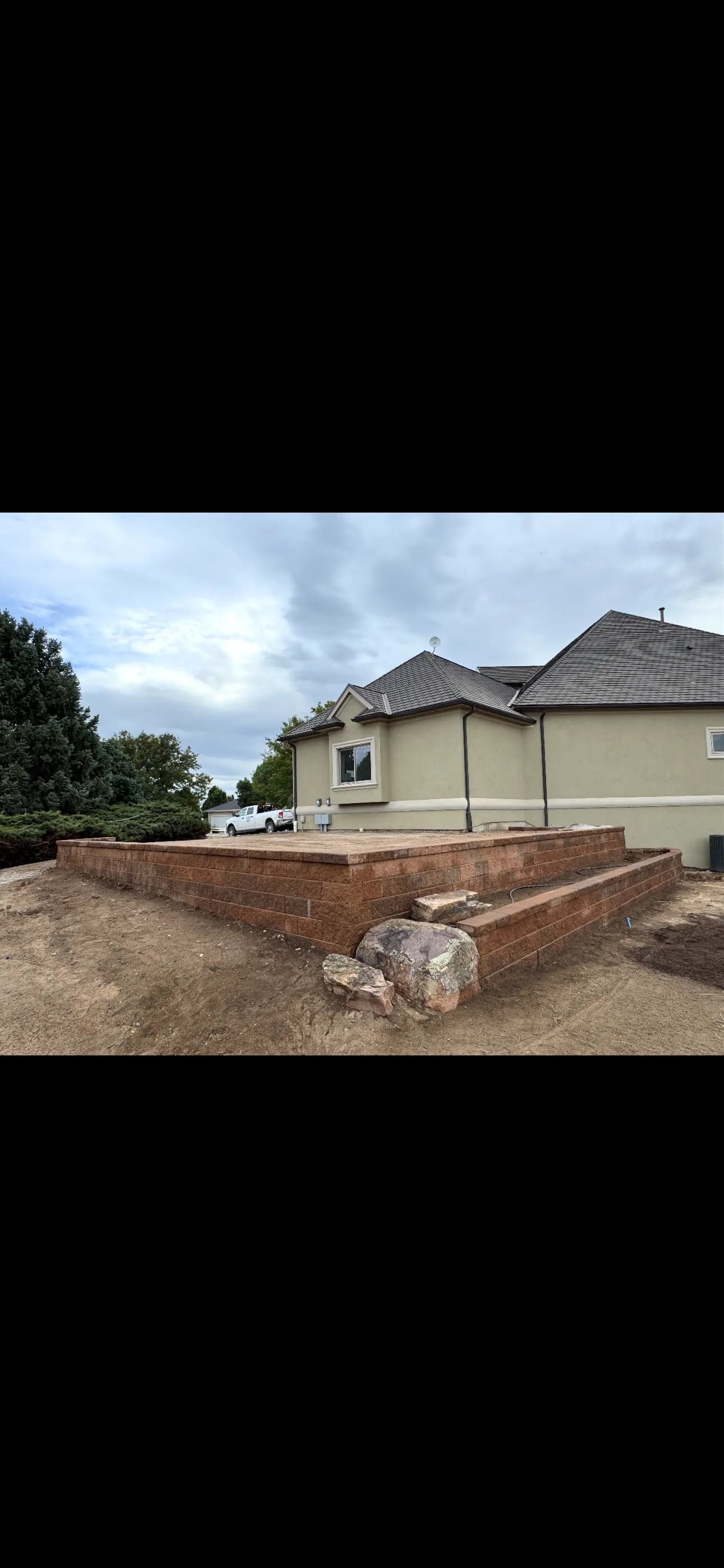 Gallery photos for Tiered Retaining Wall with Paver Steps Built to Last: Image #1