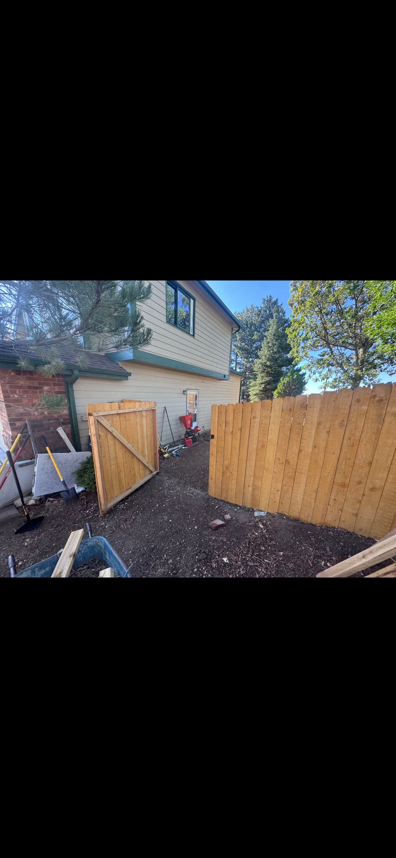 Gallery photos for Regrading, Drainage, Retaining Wall and Fence Replacement to Stop Foundation Water Damage: Image #1