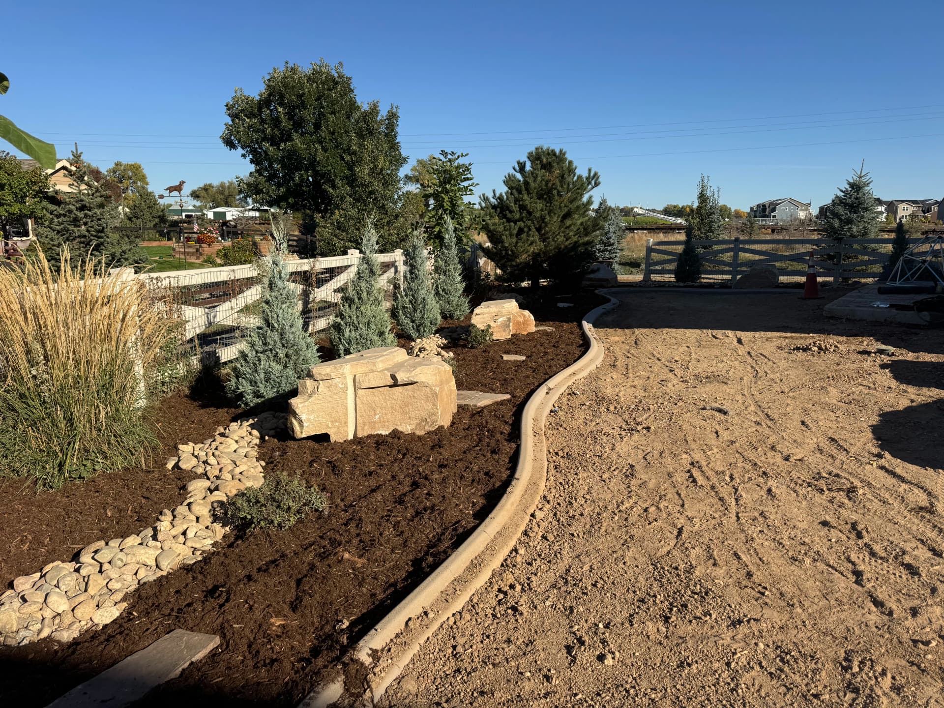 Gallery photos for Full Backyard Overhaul with Paver Patio and Boulder Seating Wall: Image #2