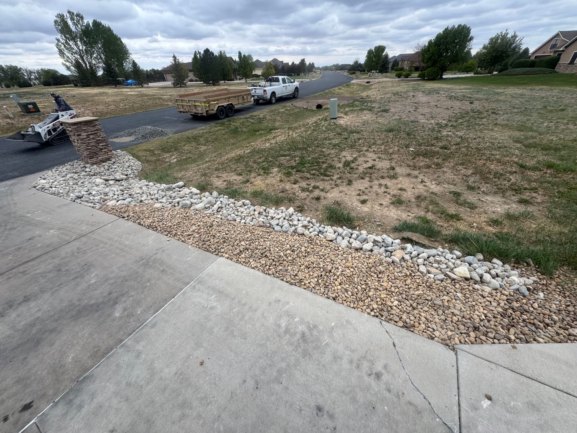 Gallery photos for 15 Tons of Cobble Turned a Bare Dirt Area Into a Rock Garden: Image #2