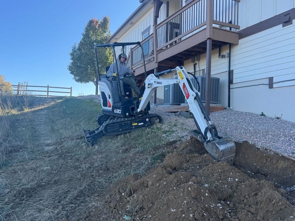 Building Strong Foundations with a 160-Foot Retaining Wall image