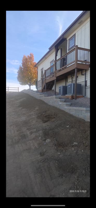 Gallery photos for Building Strong Foundations with a 160-Foot Retaining Wall: Image #1